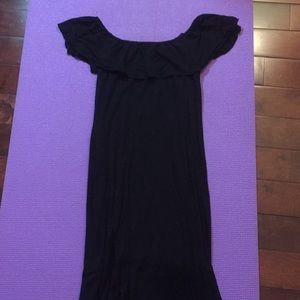 Plain black off the shoulder dress.